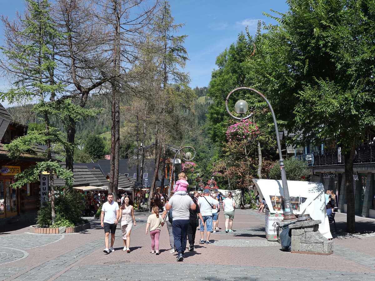 Visitors walking along Krupówki street in Zakopane